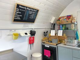 Reception area with price list and paying machine