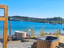 Wood fired hot tubs next to the lake