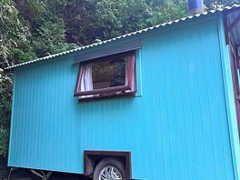 Lovely green hut.