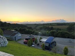 Bottom tier of the campsite from the top. shows the size of a single plot and the facilities