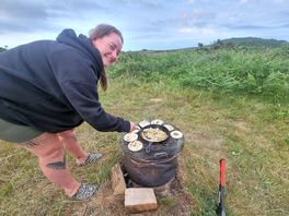 Becky cooking food.