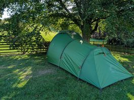Tent pitched under tree