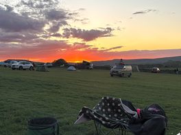 Amazing sunset view looking out onto the stunning green grass hills.