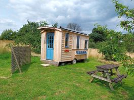 The Bunkie sleeps 4 heated by passive solar and air heater. Showers and tiolet block 30meters away.