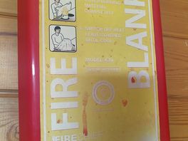 Fire blanket full of marks.