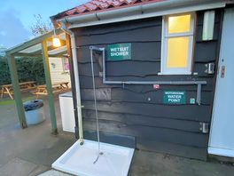 Wetsuit shower. may have used for the bikes…