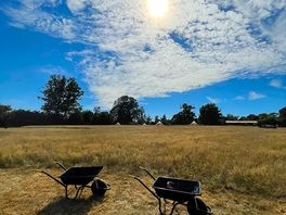 Wheelbarrows plentiful to take equipment from car to pitch.