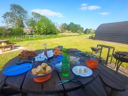 Deck. brought my own bbq and used the complementary fire wood to cook up a feast