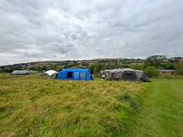 Large pitch, big enough for two tents and a gazebo