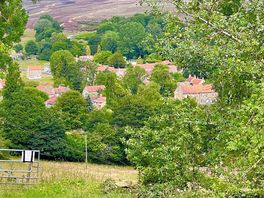 Looking down to hutton le hole from site