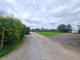 On entering the site.