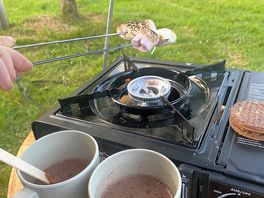 Enjoying s’mores from the tent