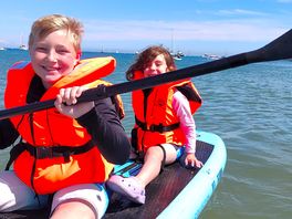 Swanage beach paddle boarding