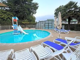 Toddler pool and covered heated pool.