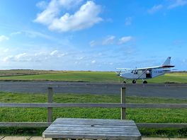 Beautiful day to watch the planes take off while enjoying a pint alongside the runway