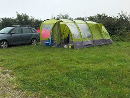 Level site with space for parked car