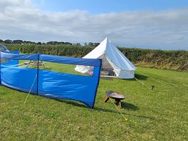 Great set up! just bring bed. nice touch to have solar lights and some battery string lights.