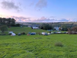 Looking back from the hill on the site and house.