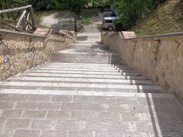 Steps down to another level