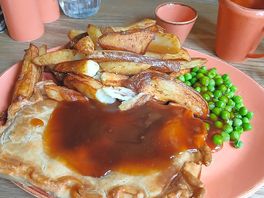 Homemade chicken, ham and leek pie, chips and gravy, delicious.