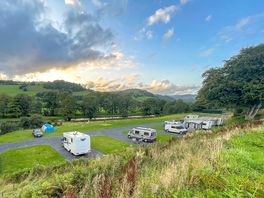 Electric hardstandings and electric grass pitches with non electric grass pitches through gate