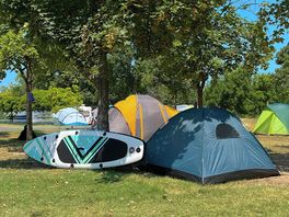 Powered grass and earth tent campsite