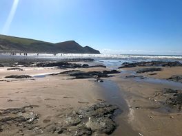 Near by beach wardened with surf ,rock pooling , parking cafe and pub toilets a family sandy beach