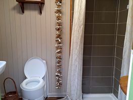 Heated shower room