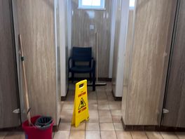 Toilets being cleaned
