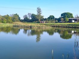 The lake and sheherds huts in the distance.