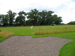 Non-electric grass pitch with lawn area and view from carriage