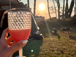 Sunset relax while kids play football next to us.