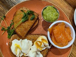 Poached eggs on toast with guac & salmon