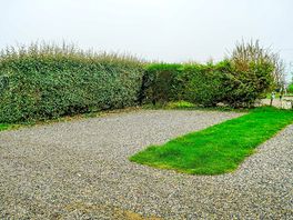 Gravel Hardstanding Pitch with electric, water and grey waste drainage. Parking available nearby.