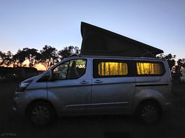 A peaceful sunset in our campervan.