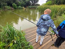 My son getting a taster of fishing. loved it.