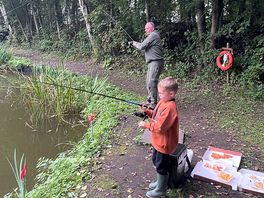 Grandad teaching him to fish