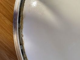 Scum around shower edge