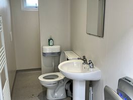 The shower and toilet all in one