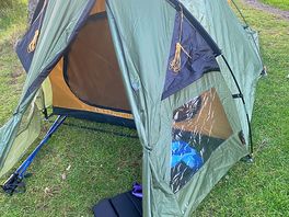 Tent set up between the 2 flags