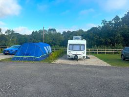 Our tent and the caravan neighbour next to us.