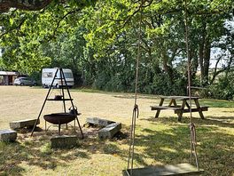 Common fire pit and a swing area