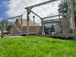Bell tent with wood-fired hot tub