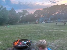 Toasting marshmallows as the sun goes down