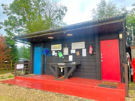 Male and female toilets and shower. washing up area.