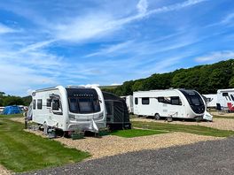 Fully-serviced hardstanding touring pitch
