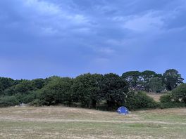 View of the campsite with some storm clouds