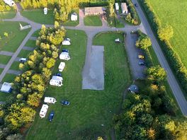A bird's-eye view of the site, with Stratton Lane on the right