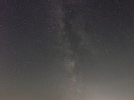 The milky way stretching up over the campsite.