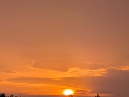 Sunset over the camping field